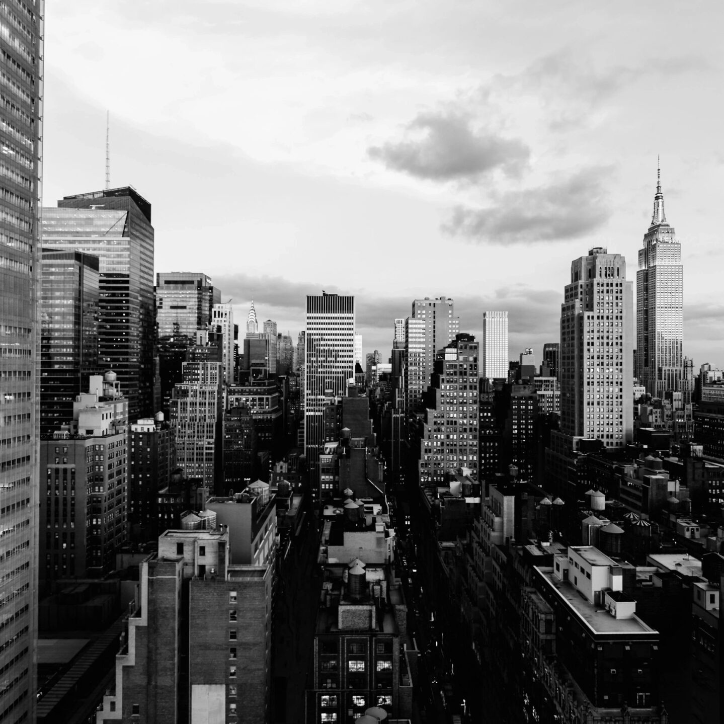 Tall buildings under cloudy sky